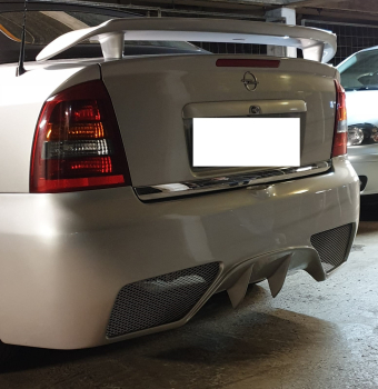 Preview: Heck Stoßstange hinten Heckschürze passend für Opel Astra G Coupe Cabrio